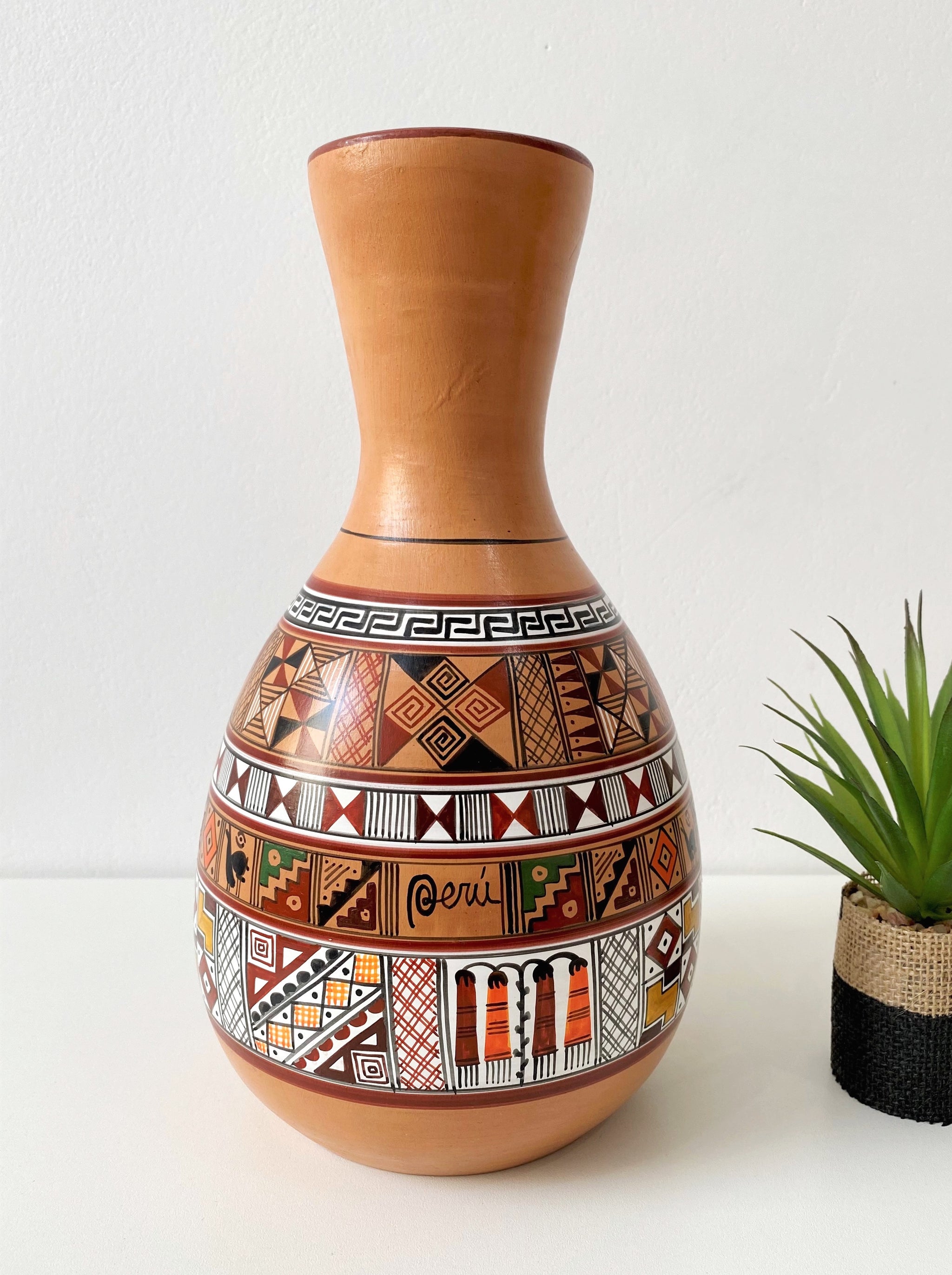 Reprodruction of old peruvian Terracotta lamas sale Vase